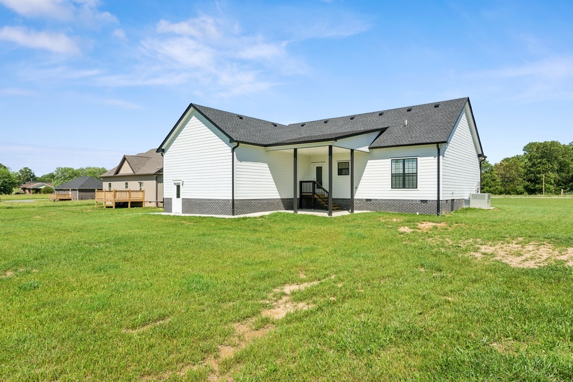 5129 Galen Road Lafayette, TN 37083 - Photo 23 of 25 a view of a house with backyard