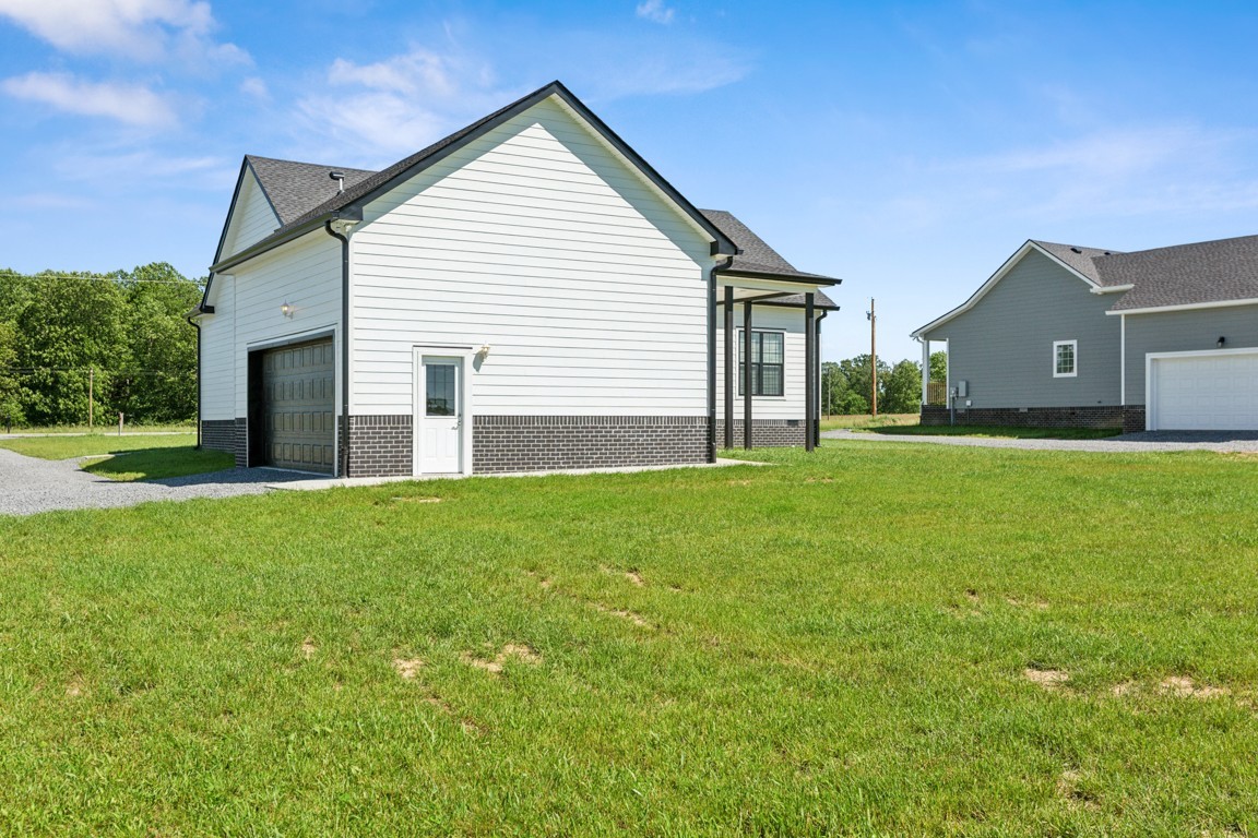 5129 Galen Road Lafayette, TN 37083 - Photo 24 of 25 a view of a backyard of the house