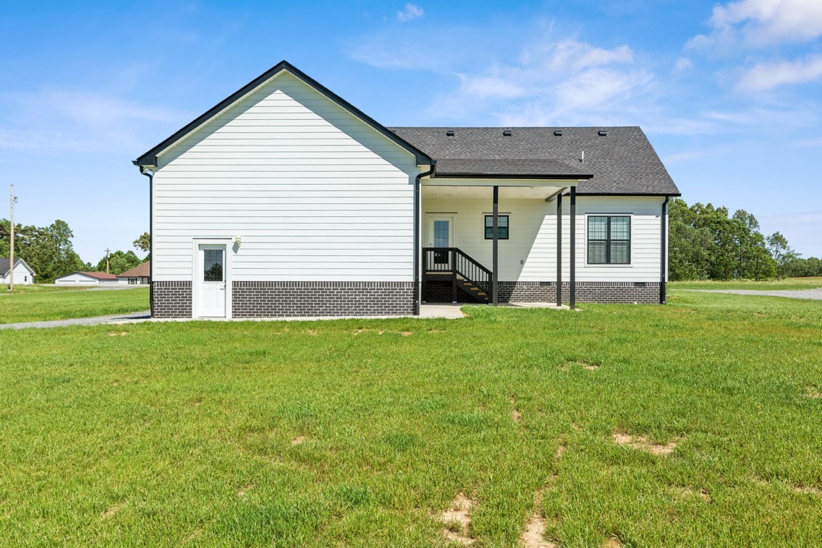 5129 Galen Road Lafayette, TN 37083 - Photo 25 of 25 a view of a house with backyard