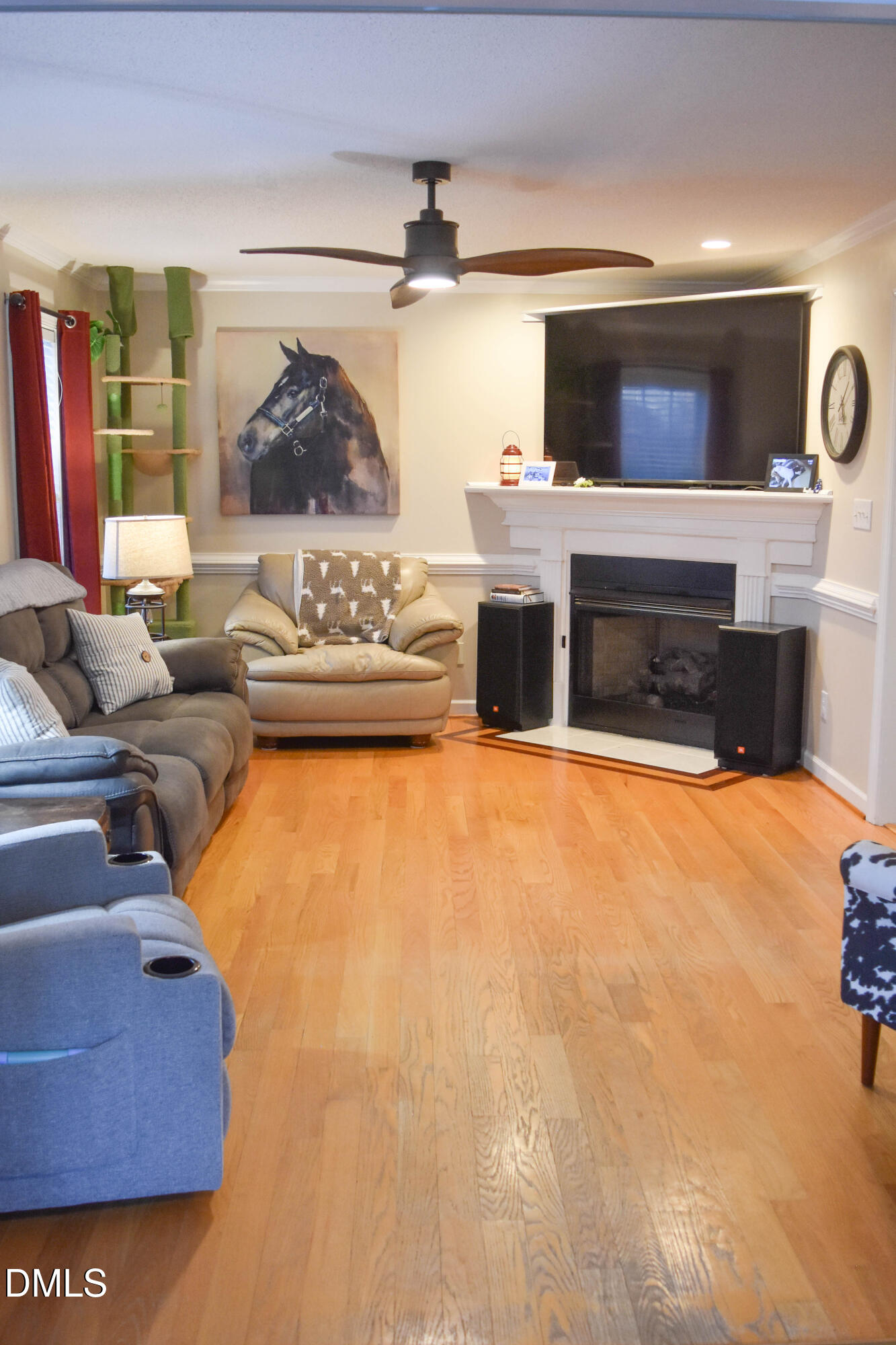 5908 Deep Spring Circle Wake Forest, NC 27587 - Photo 11 of 51 a living room with furniture and a fireplace