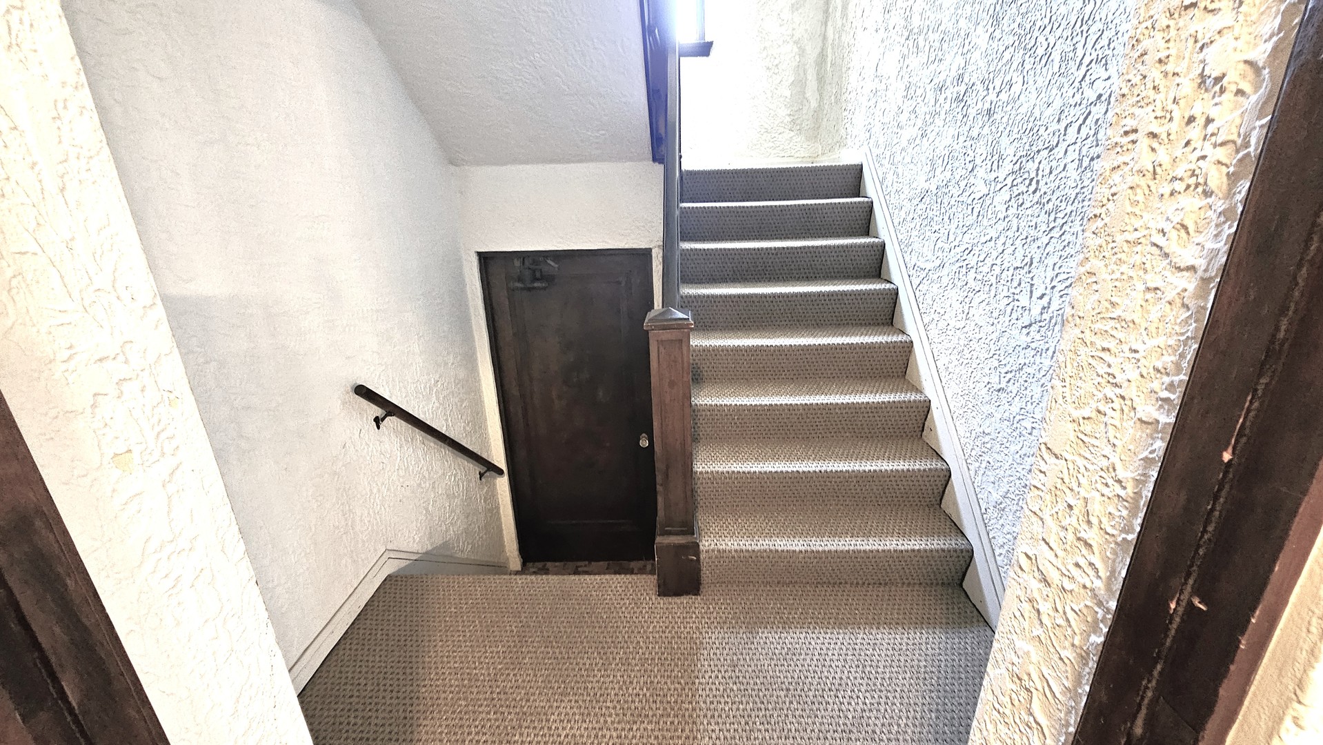 410 North Raynor Avenue, Unit 1W Joliet, IL 60435 - Photo 11 of 64 a view of staircase with white walls and windows