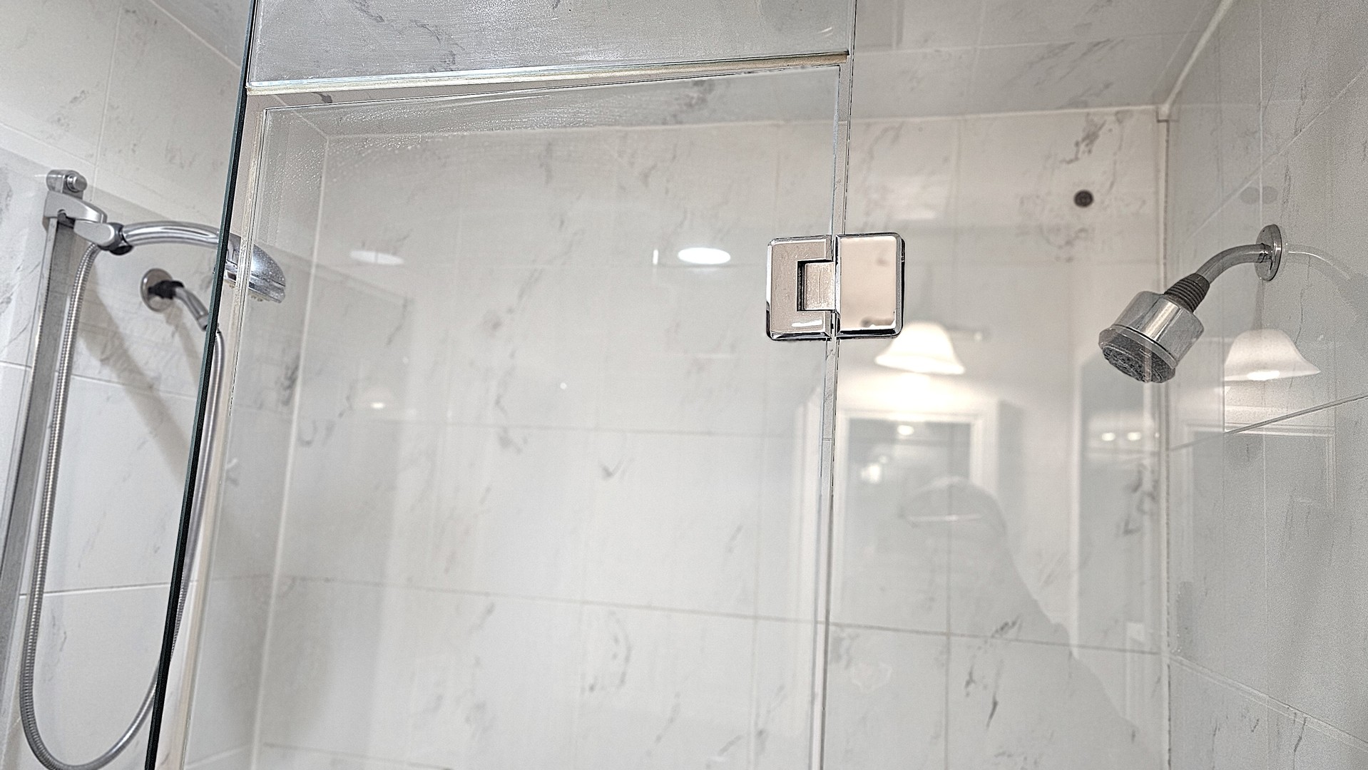 410 North Raynor Avenue, Unit 1W Joliet, IL 60435 - Photo 21 of 64 a bathroom with a shower