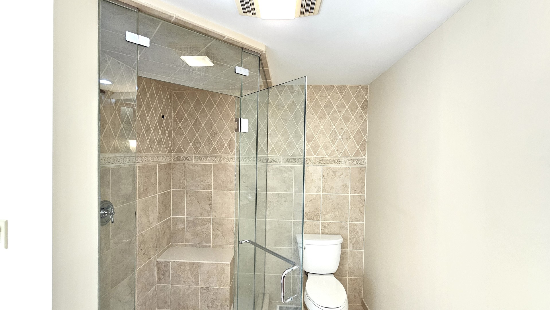 410 North Raynor Avenue, Unit 1W Joliet, IL 60435 - Photo 44 of 64 a bathroom with a shower and a sink