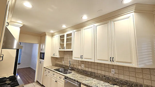 a view of walk in closet with window
