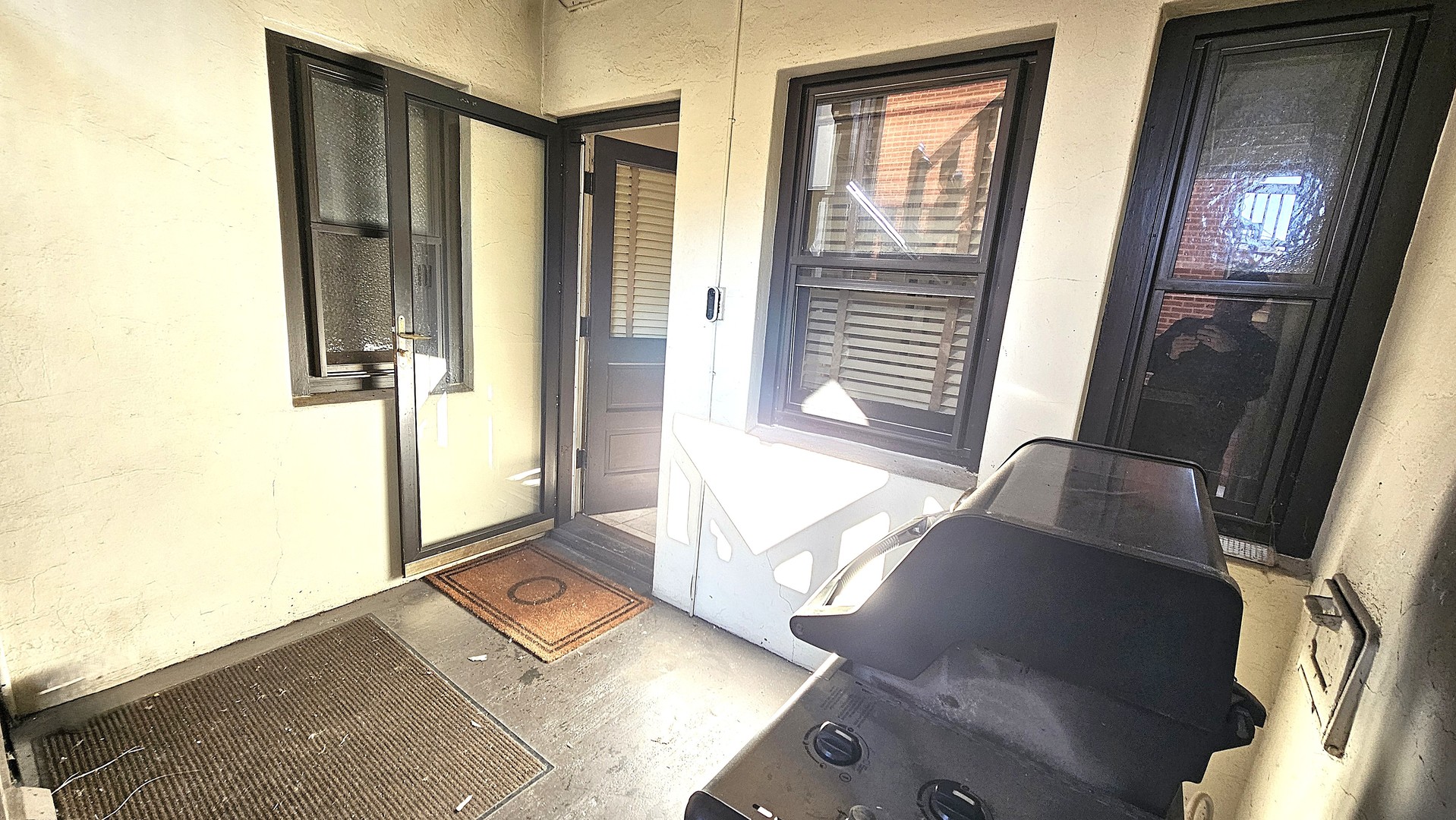 410 North Raynor Avenue, Unit 1W Joliet, IL 60435 - Photo 56 of 64 a view of a bathroom with mirror and door