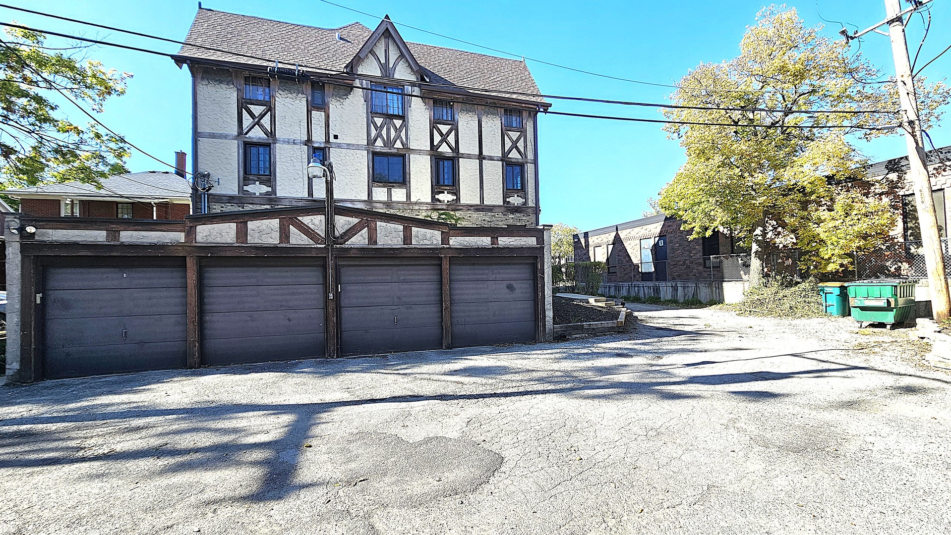410 North Raynor Avenue, Unit 1W Joliet, IL 60435 - Photo 9 of 64 a view of a house with a garage