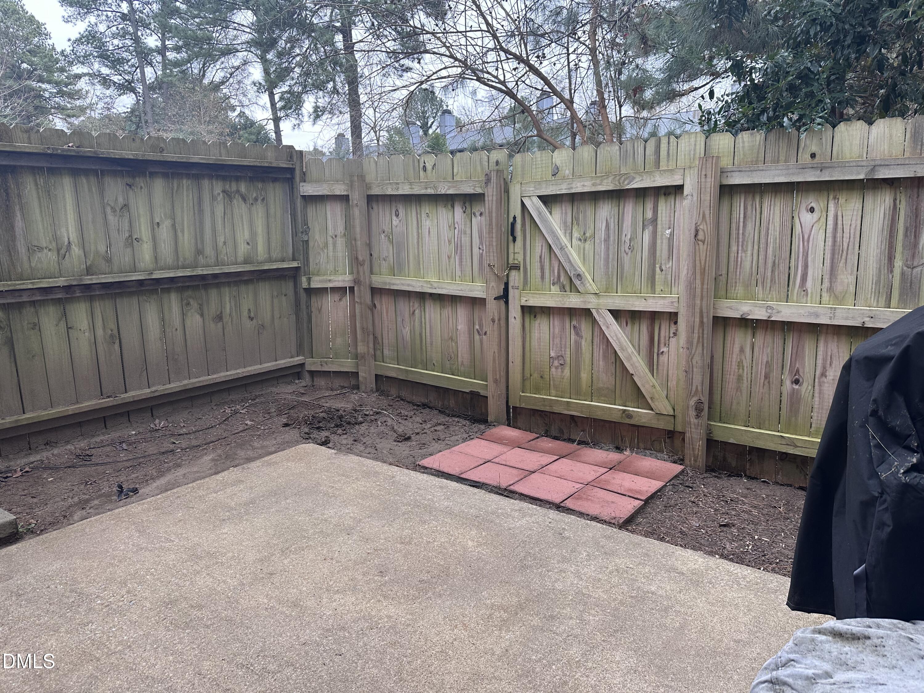 1440 Kent Road Raleigh, NC 27606 - Photo 19 of 21 a backyard of a house