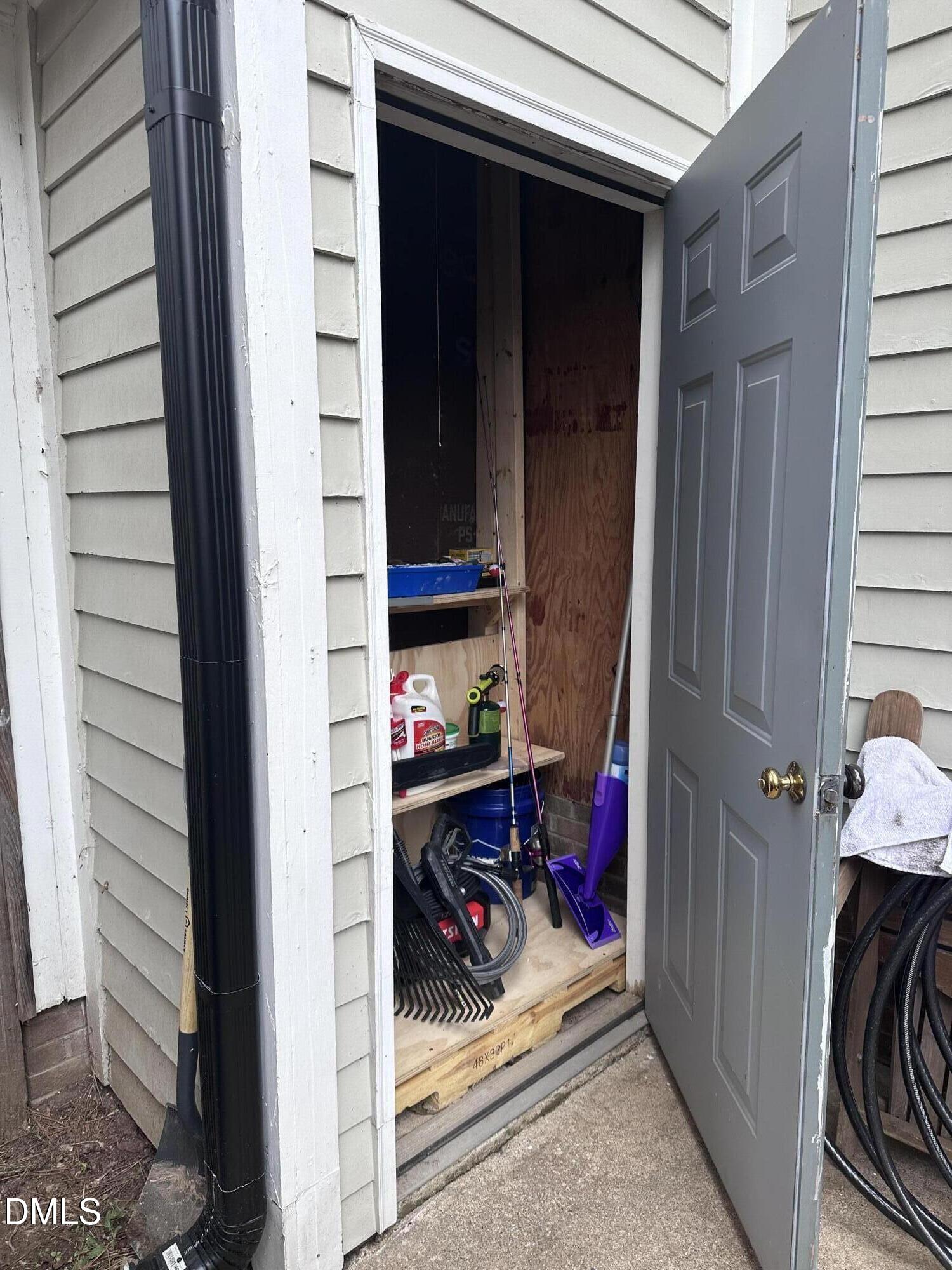 1440 Kent Road Raleigh, NC 27606 - Photo 5 of 13 a view of living room and front door