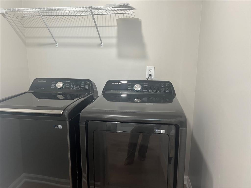 2896 Vining Ridge Terrace Decatur, GA 30034 - Photo 14 of 24 a utility room with dryer and washer