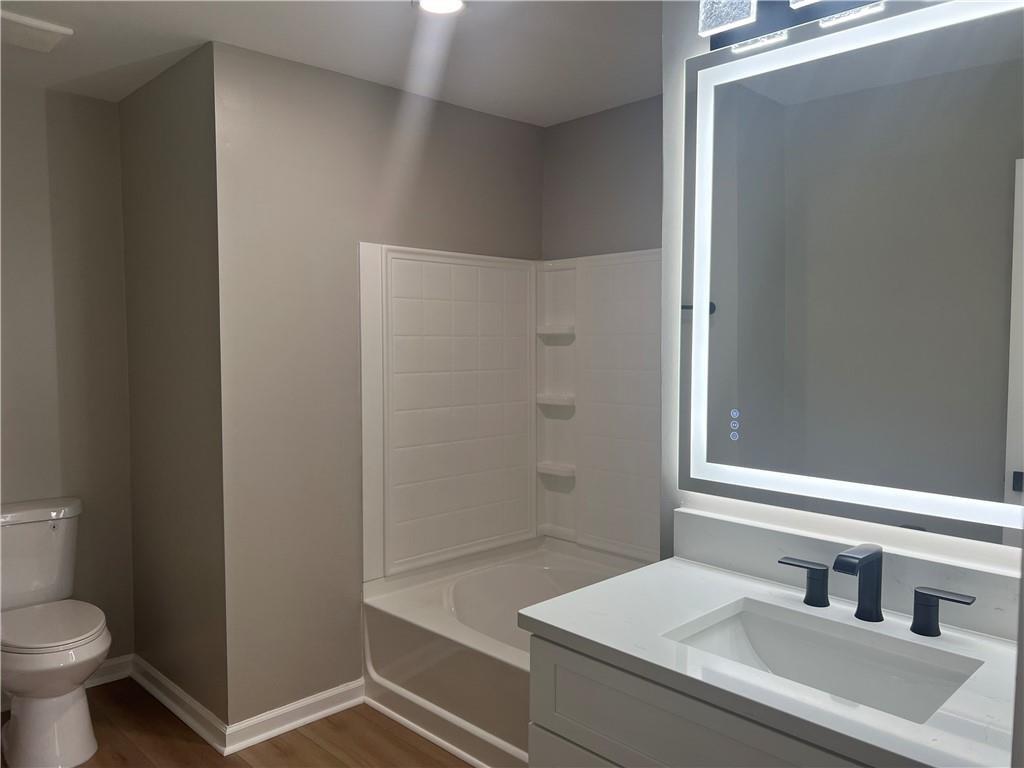 2896 Vining Ridge Terrace Decatur, GA 30034 - Photo 20 of 24 a bathroom with a sink and a mirror