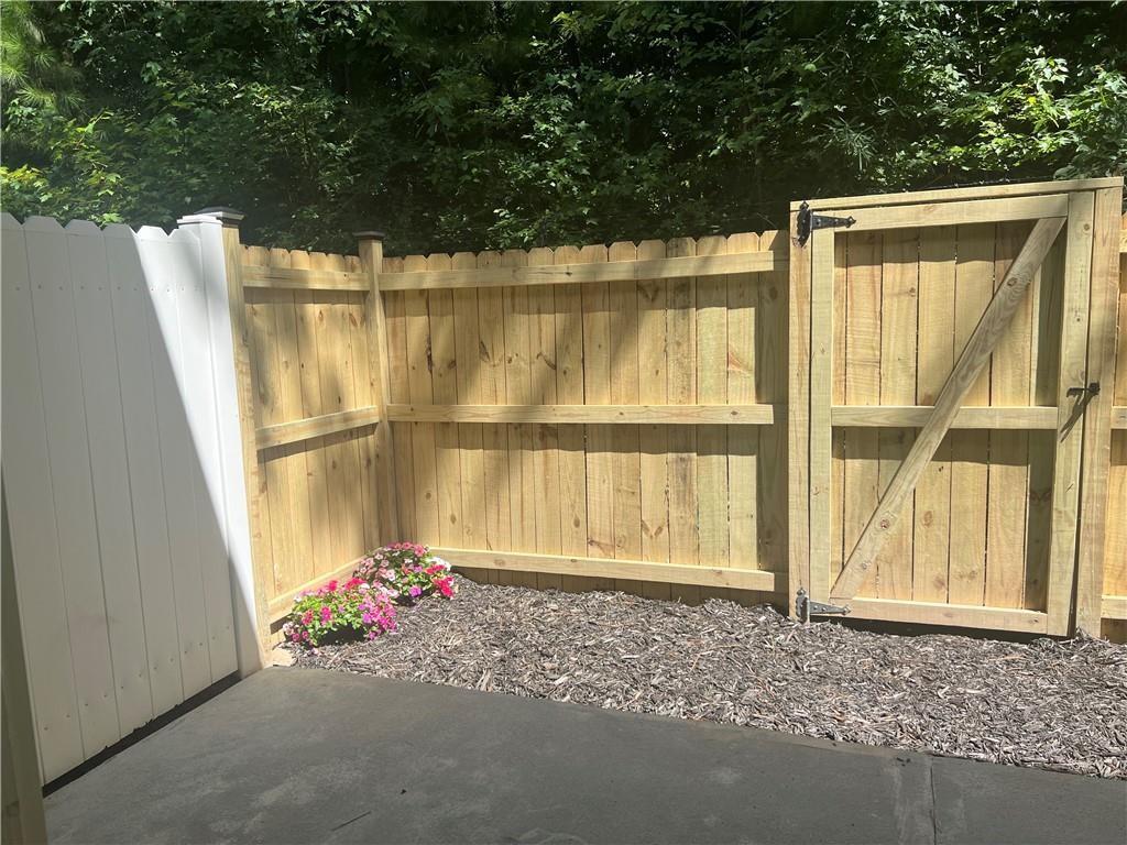 2896 Vining Ridge Terrace Decatur, GA 30034 - Photo 21 of 24 a front view of a house with a yard