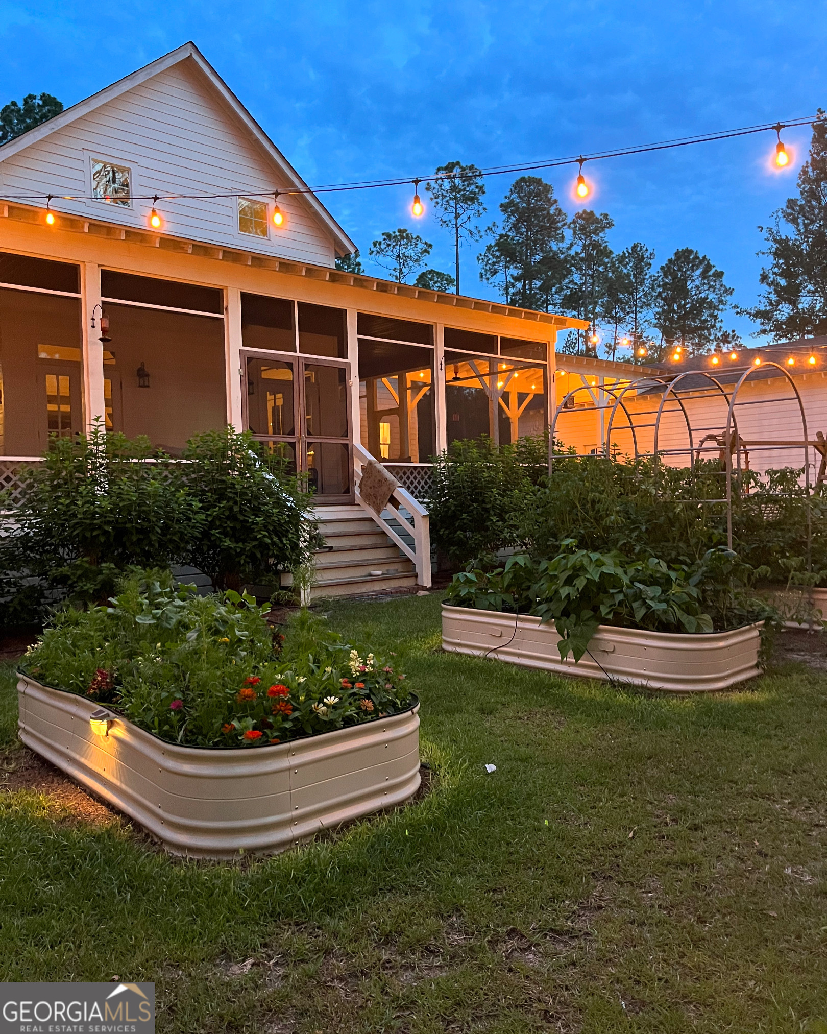 182 Rogers Street Hazlehurst, GA 31539 - Photo 3 of 38 a front view of house with yard and outdoor seating
