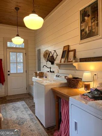 a kitchen that has a sink and a stove