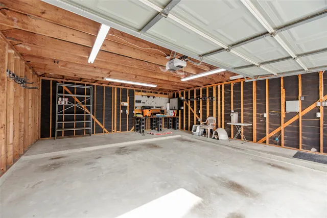 a view of an empty room with garage