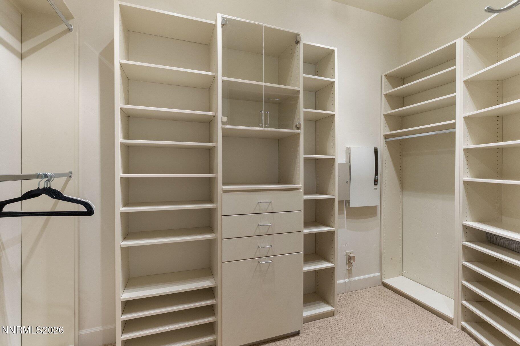 16925 Rue Du Parc Reno, NV 89511 - Photo 17 of 34 a view of walk in closet with empty racks