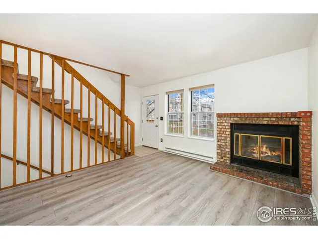 a kitchen with a sink and a window