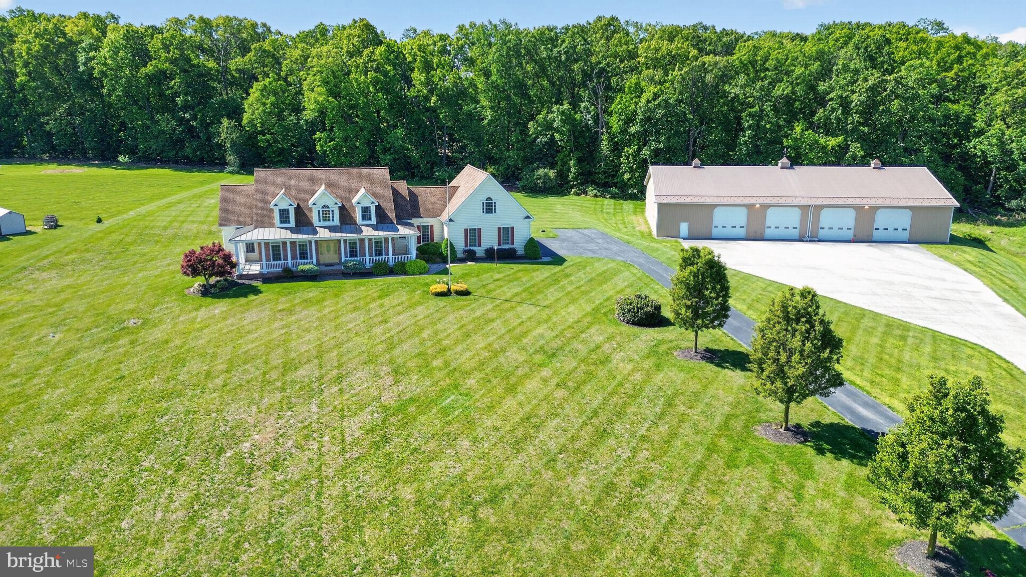 1165 Line Road Westminster, MD 21158 - Photo 2 of 75 a front view of a house with garden