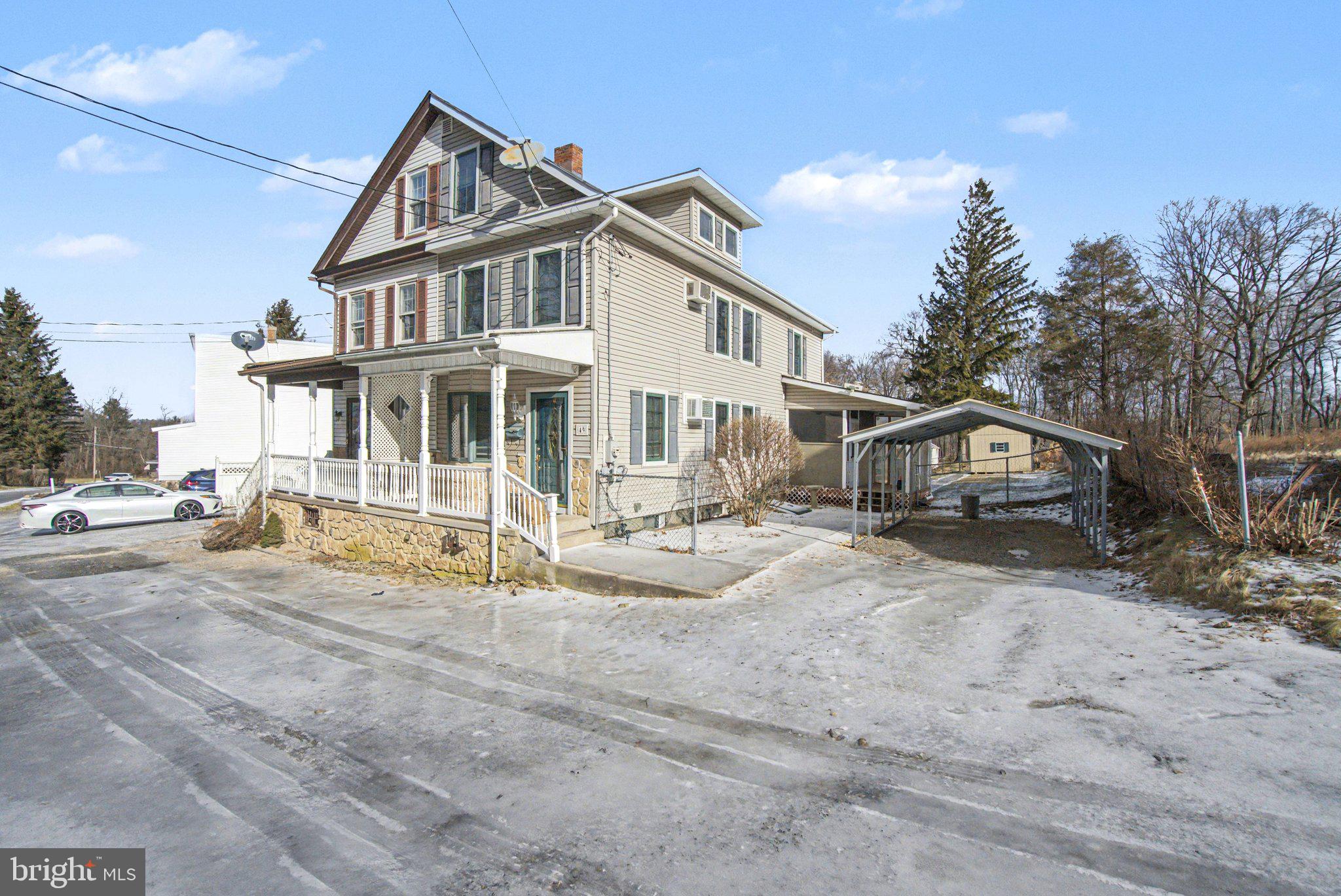 49 Main Street Pine Grove, PA 17963 - Photo 1 of 38 a house with trees in front of it