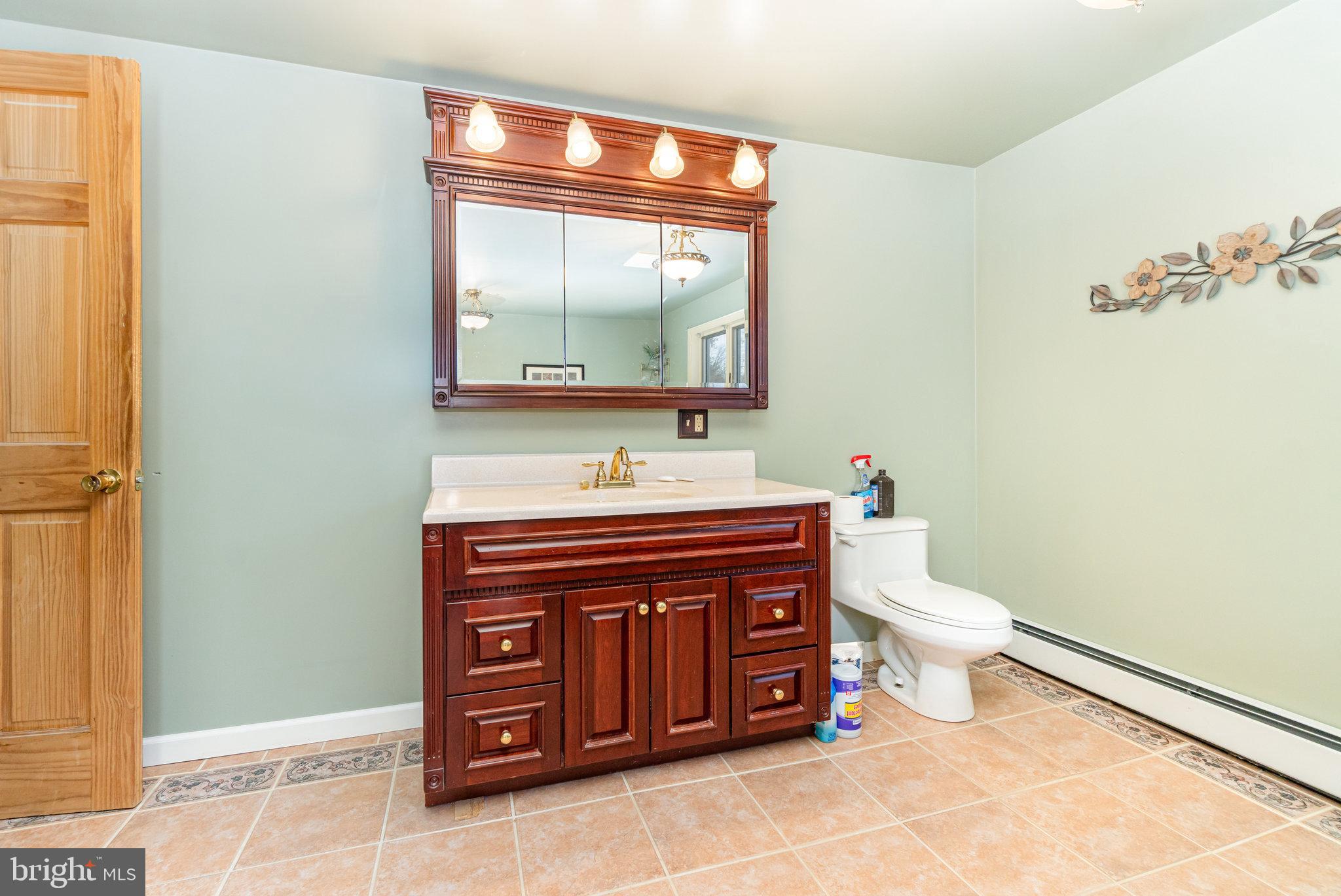 49 Main Street Pine Grove, PA 17963 - Photo 17 of 38 a bathroom with a sink and a toilet