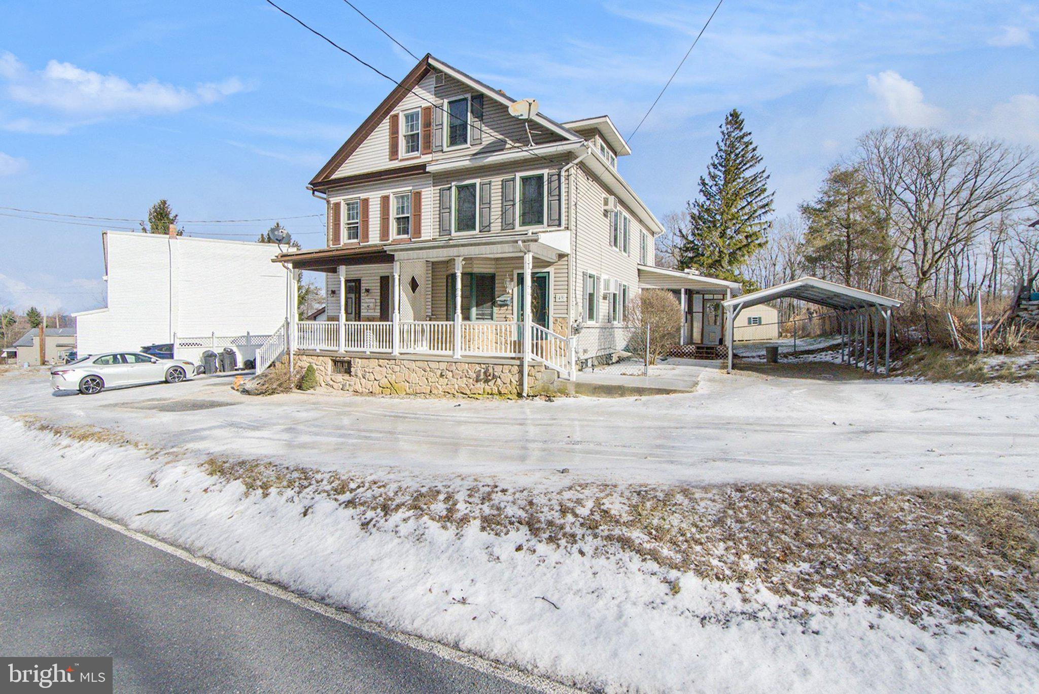 49 Main Street Pine Grove, PA 17963 - Photo 2 of 38 a front view of a house with a yard