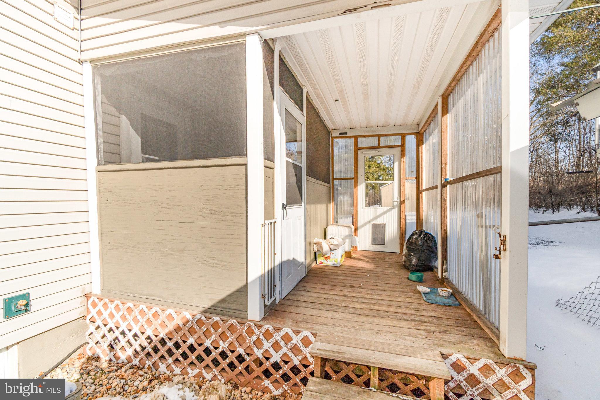 49 Main Street Pine Grove, PA 17963 - Photo 26 of 38 a view of a balcony with wooden floor and furniture