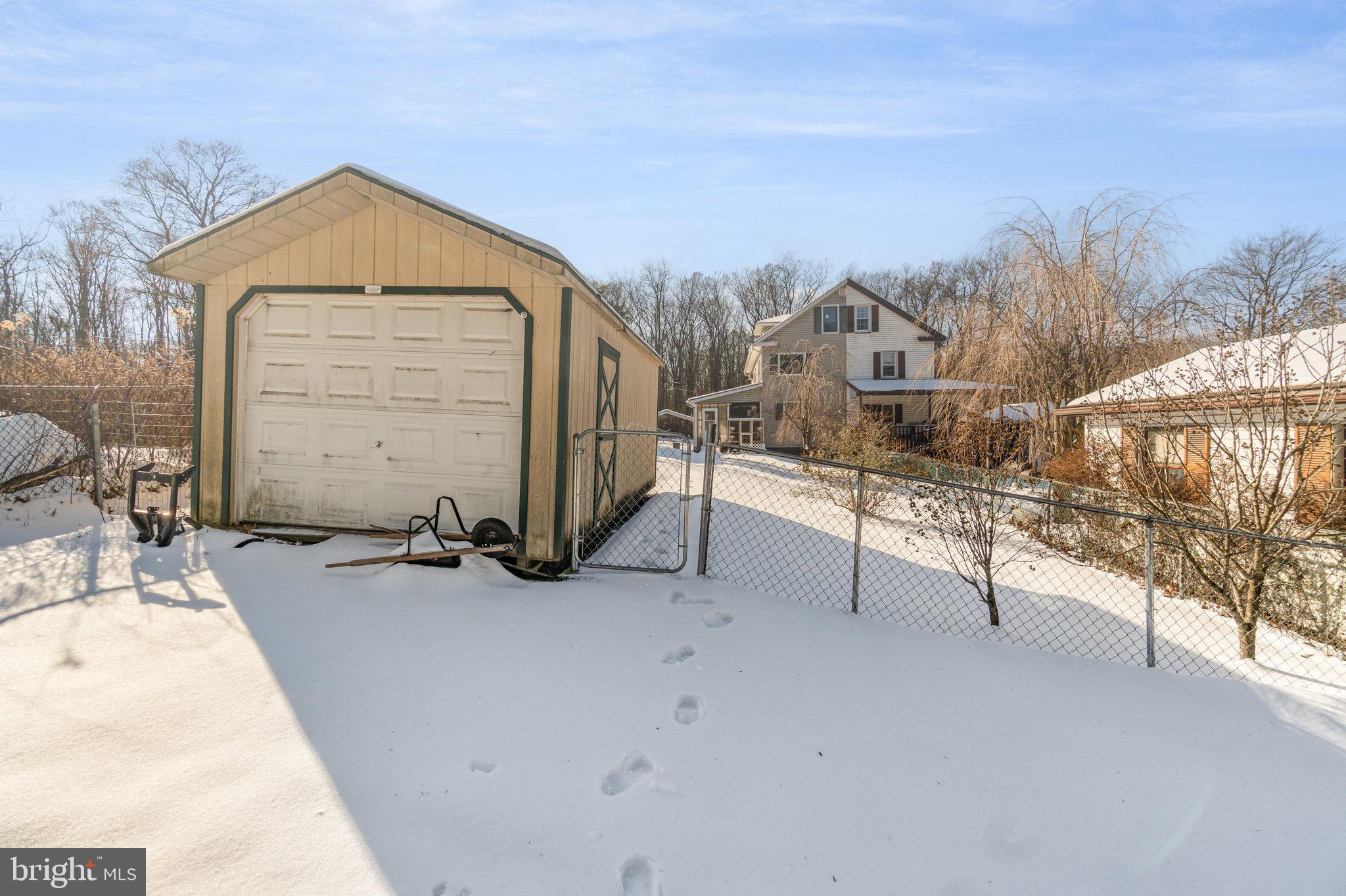 49 Main Street Pine Grove, PA 17963 - Photo 29 of 38 a view of a house with a bench