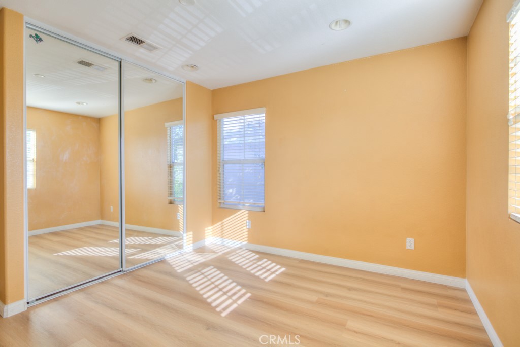 4587 Vincent Way Riverside, CA 92501 - Photo 39 of 51 a view of a bathroom with a glass shower door