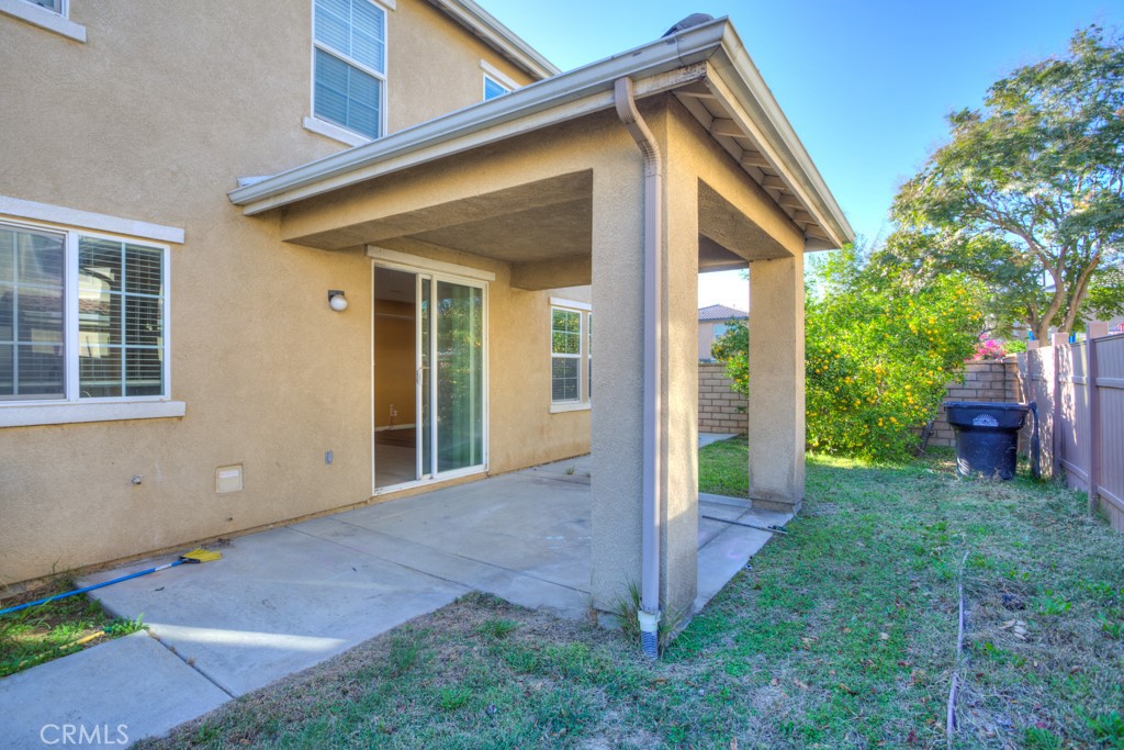 4587 Vincent Way Riverside, CA 92501 - Photo 44 of 51 a view of a house with backyard and porch