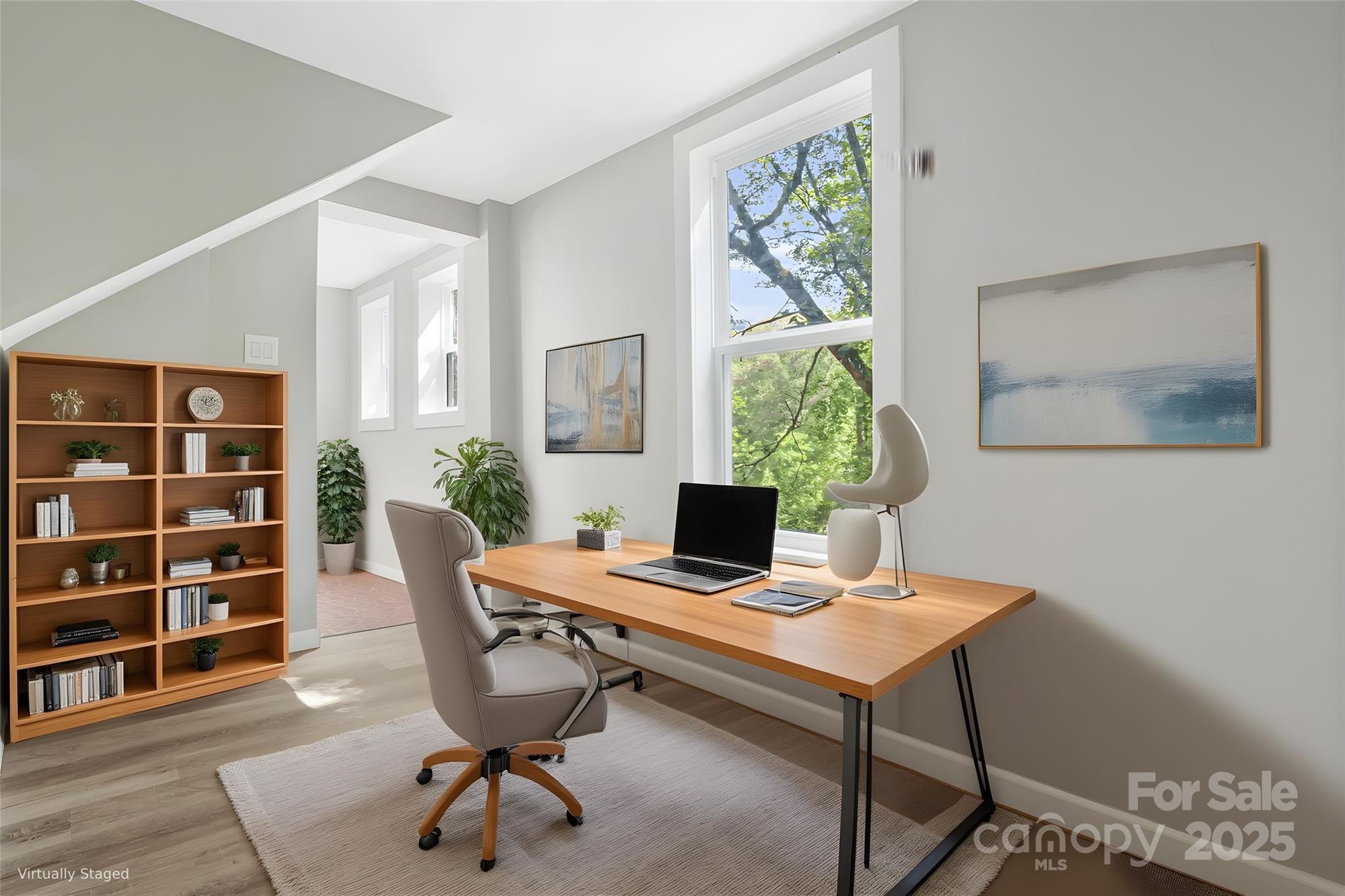 95 Grassy View Road Candler, NC 28715 - Photo 23 of 27 a workspace with furniture and a potted plant