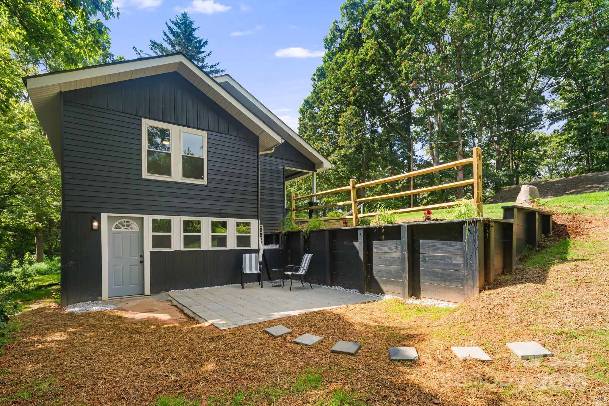 95 Grassy View Road Candler, NC 28715 - Photo 27 of 27 a front view of a house with a yard