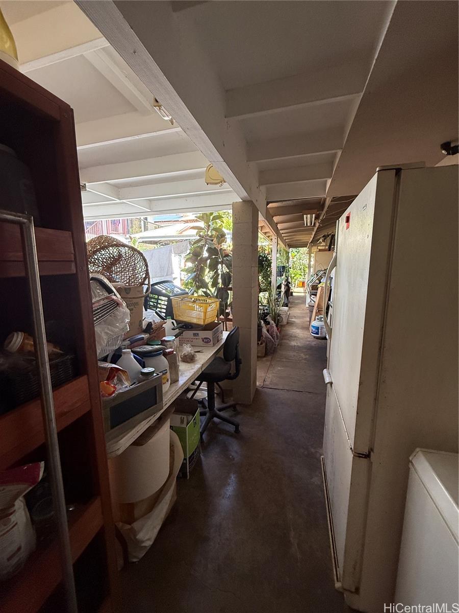 94-571 Ana Aina Place Waipahu, HI 96797 - Photo 8 of 16 a view of a room with gym equipment