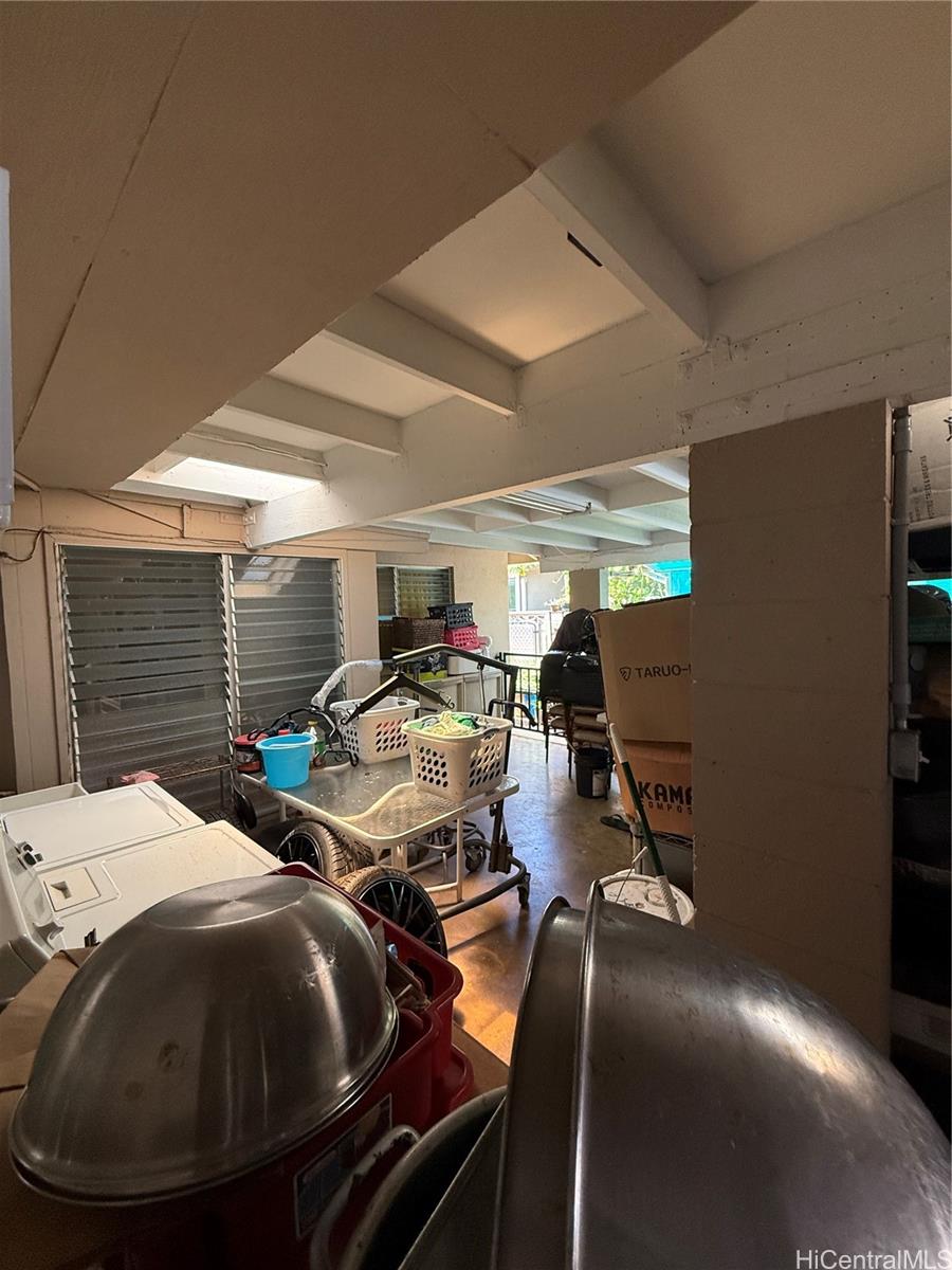 94-571 Ana Aina Place Waipahu, HI 96797 - Photo 10 of 16 a bed room with two beds and a chandelier