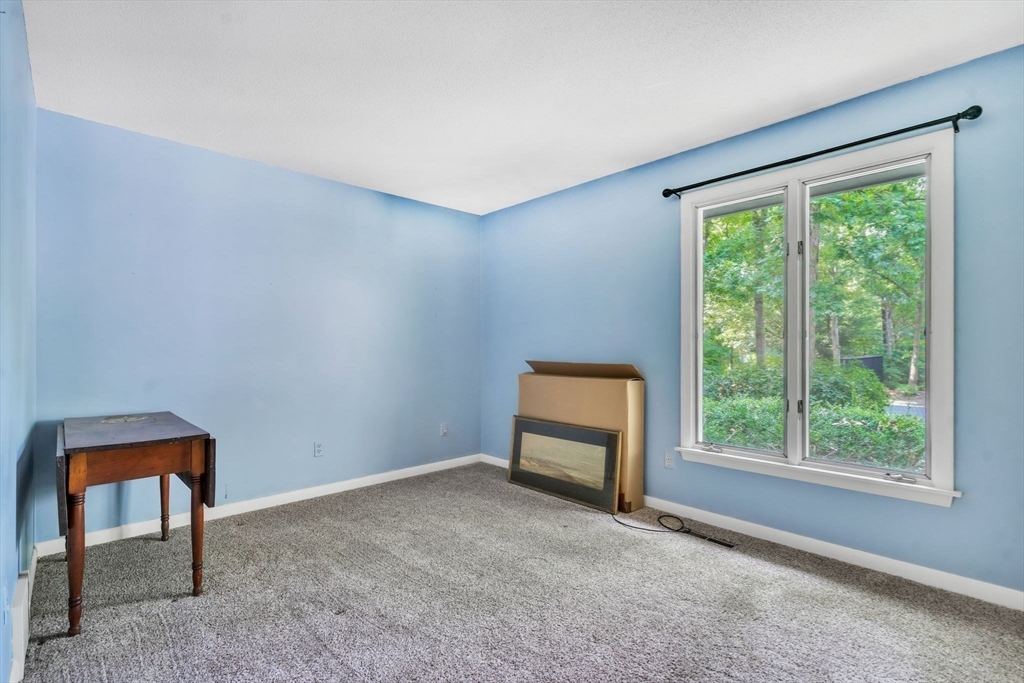 11 Brooks Road Longmeadow, MA 01106 - Photo 17 of 27 a room with a window and a table
