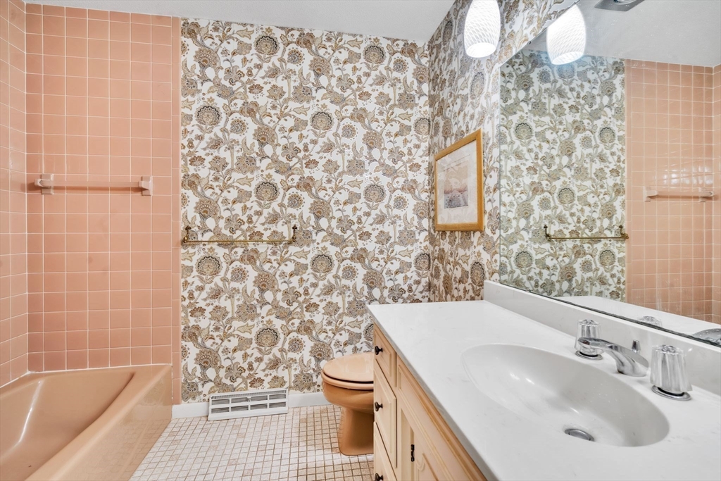 11 Brooks Road Longmeadow, MA 01106 - Photo 18 of 27 a bathroom with a sink toilet and shower
