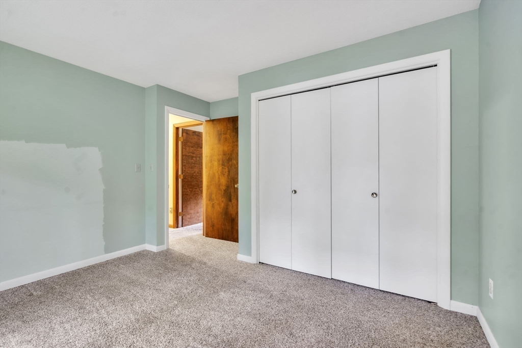 11 Brooks Road Longmeadow, MA 01106 - Photo 19 of 27 a view of an empty room with closet and wooden floor