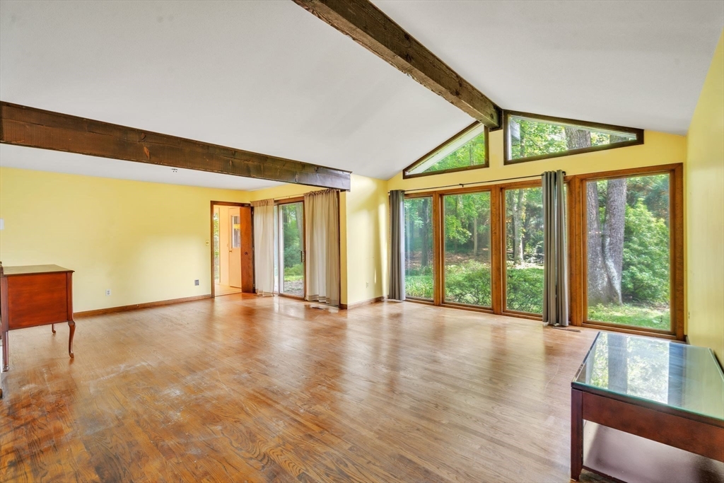 11 Brooks Road Longmeadow, MA 01106 - Photo 5 of 27 a view of an empty room with wooden floor and windows