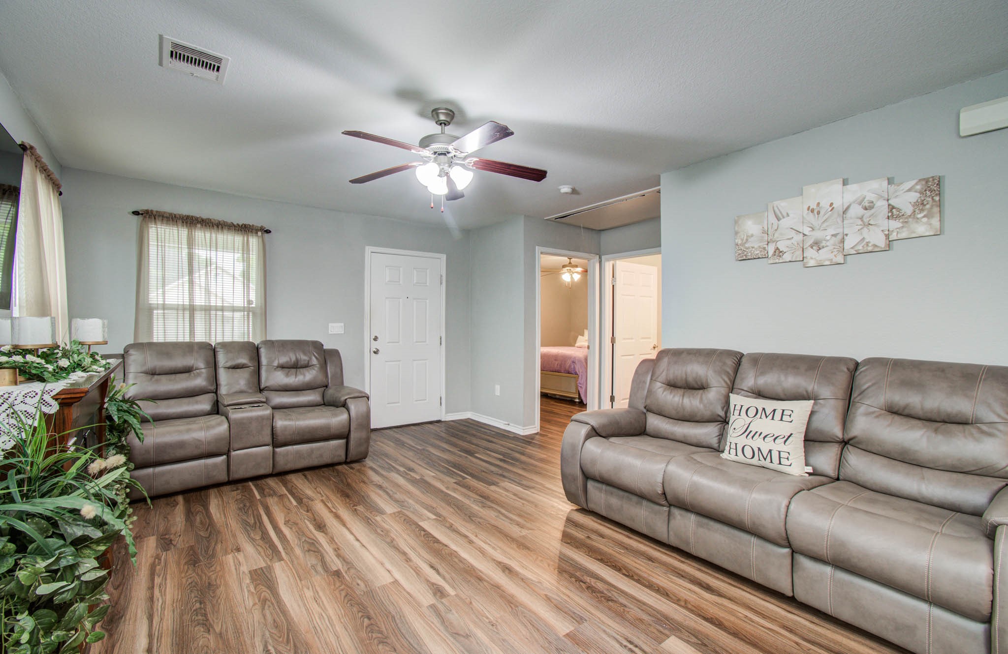 2722 Vega Houston, TX 77088 - Photo 11 of 45 a living room with furniture and wooden floor
