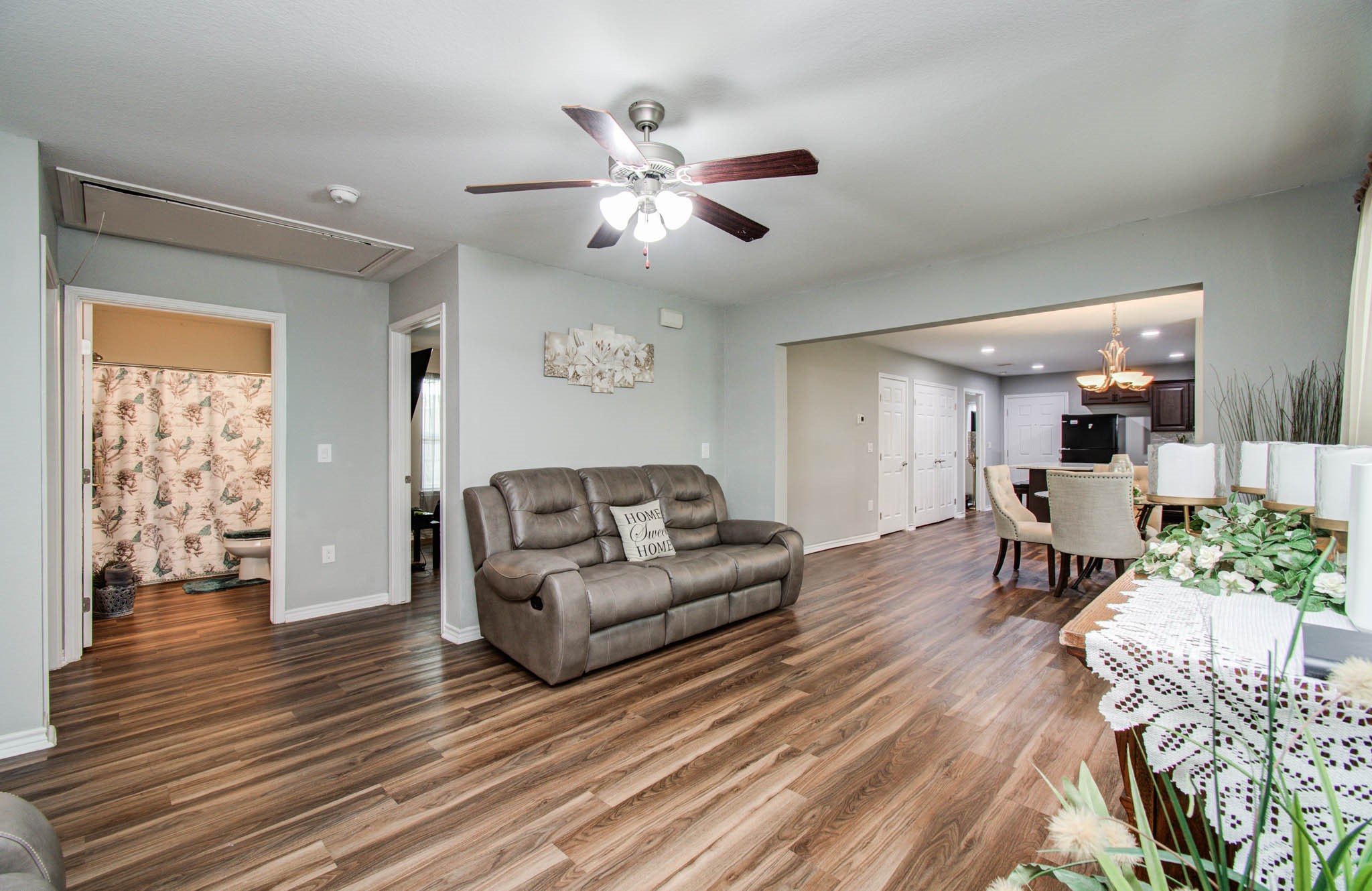 2722 Vega Houston, TX 77088 - Photo 13 of 45 a living room with furniture and a wooden floor