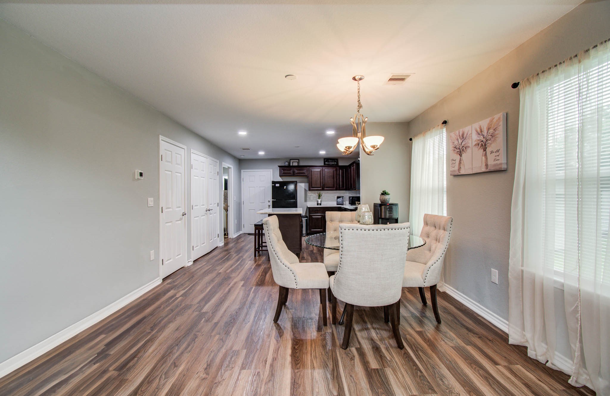 2722 Vega Houston, TX 77088 - Photo 20 of 45 a view of a dining room with furniture and wooden floor