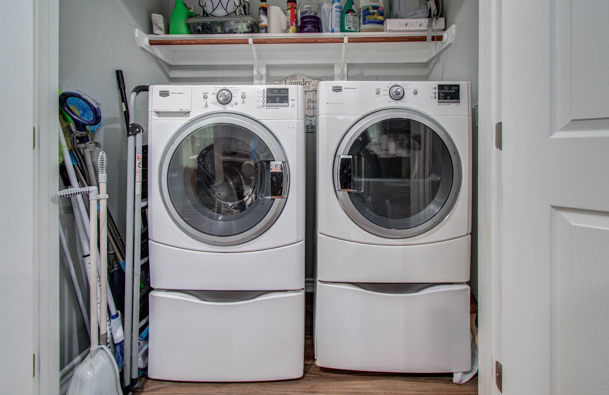 2722 Vega Houston, TX 77088 - Photo 32 of 45 a utility room with dryer and washer