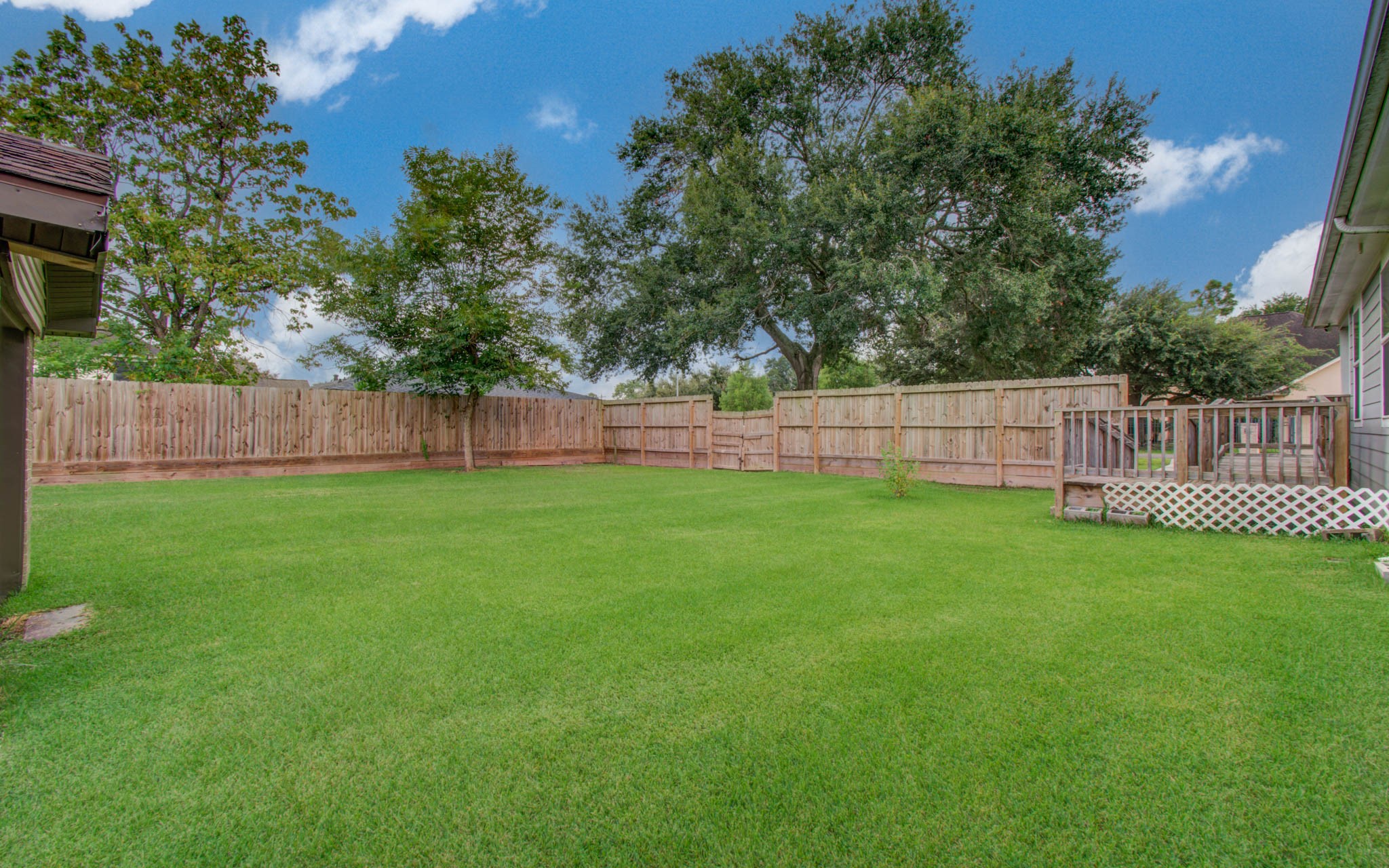 2722 Vega Houston, TX 77088 - Photo 38 of 45 a view of a yard with a wooden fence