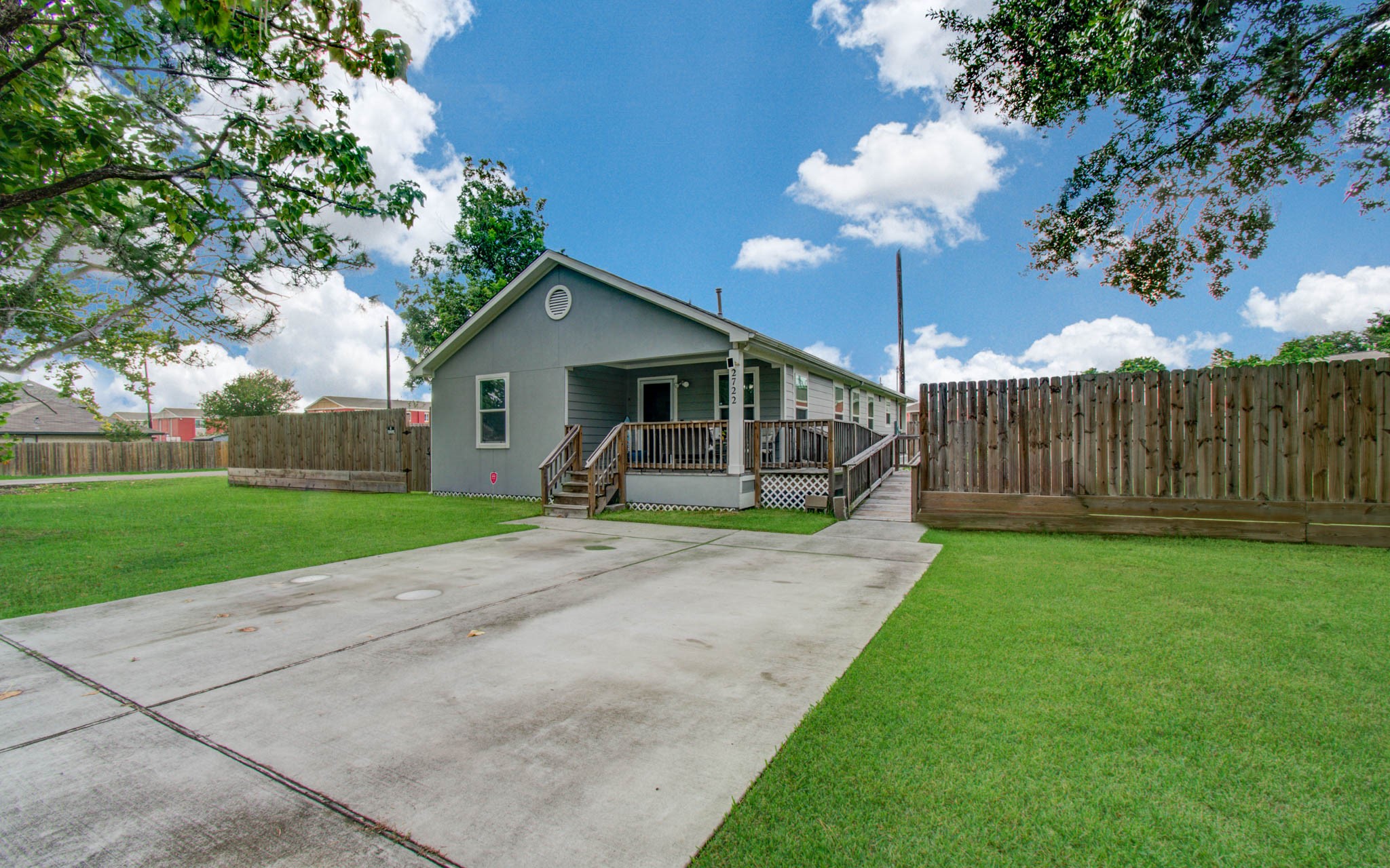 2722 Vega Houston, TX 77088 - Photo 9 of 45 a front view of house with yard and green space