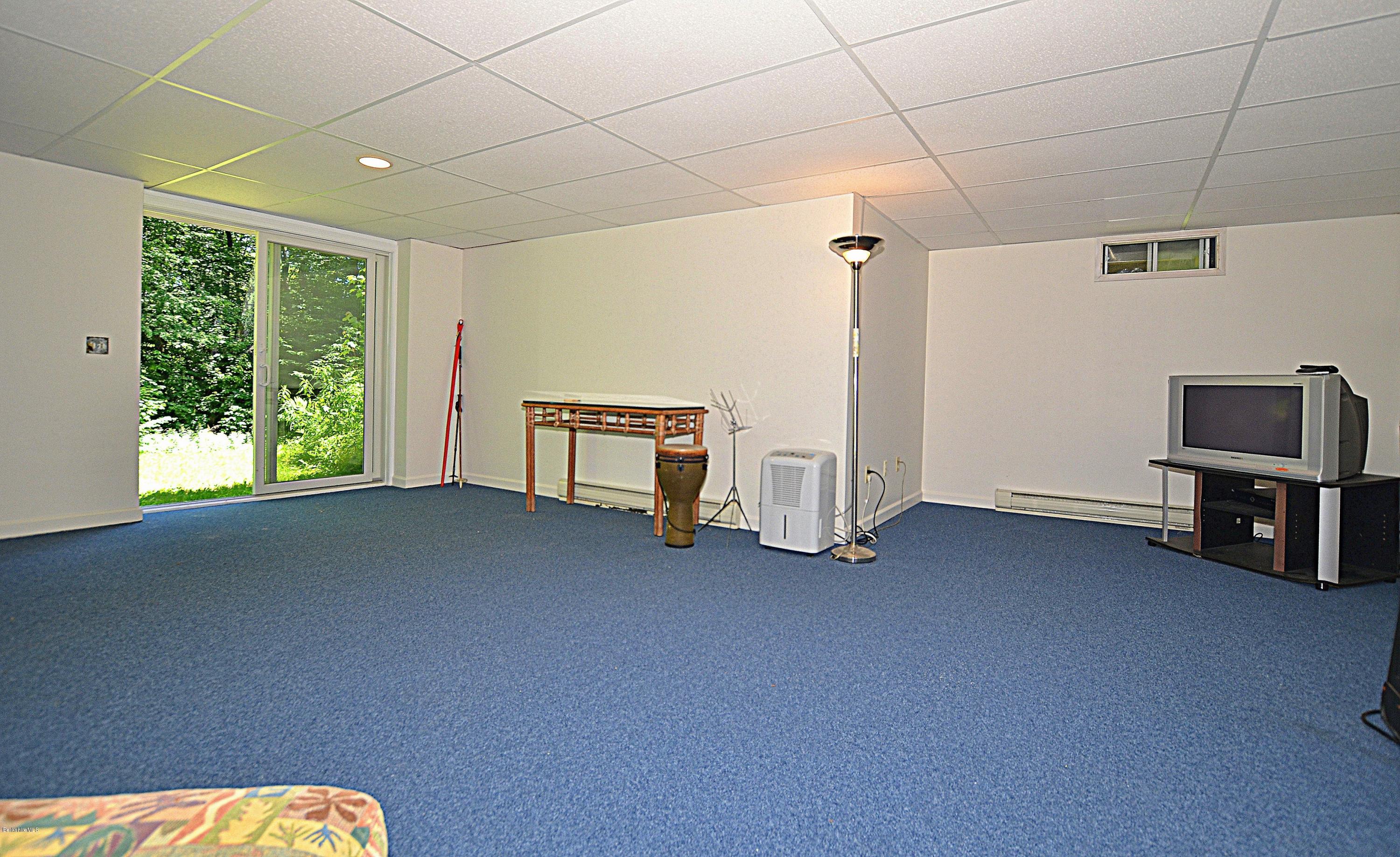 982 Fred Snow Road Becket, MA 01223 - Photo 19 of 21 a view of room with furniture and window