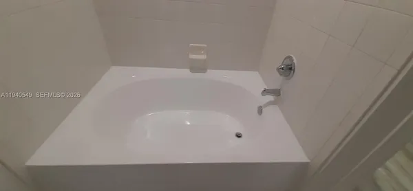 a close up of a bathtub
