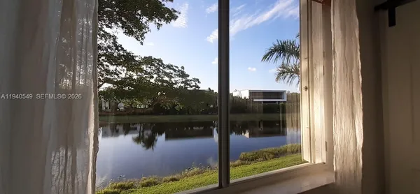 a view of a lake from a balcony