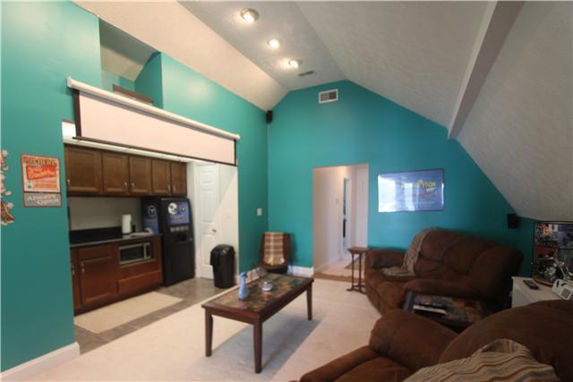 4311 Cairo Bend Road Lebanon, TN 37087 - Photo 13 of 20 Media room with projector and all media/sound equipment, equipped snack bar and easy bathroom access. Media room is completely set up and ready for movies- TV - Sports - just name it.