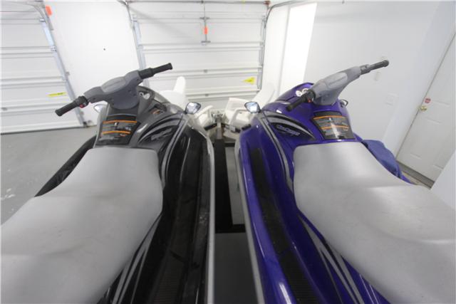 4311 Cairo Bend Road Lebanon, TN 37087 - Photo 14 of 20 Shiny pair of Jet Skis on double trailer. Garage is oversized and spotless! This home is like hitting the Lottery!