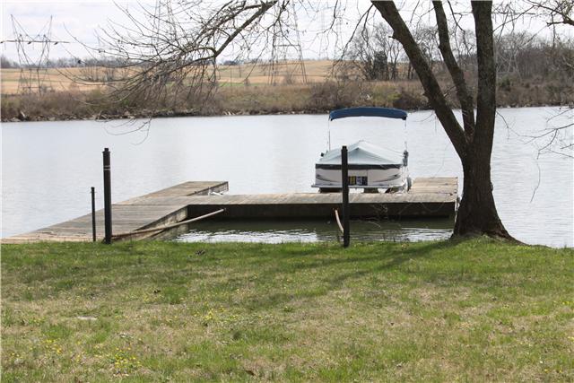 4311 Cairo Bend Road Lebanon, TN 37087 - Photo 3 of 20 View of Boat dock, farmland across cove, Pontoon Boat included + 2-jet skies + 2 kayaks. Ready for Summer fun!