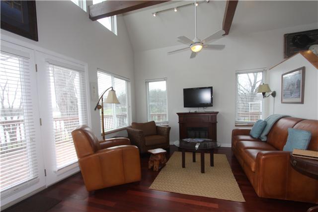 4311 Cairo Bend Road Lebanon, TN 37087 - Photo 8 of 20 Family room open to dinning and kitchen. Lot's of natural light. Watch the family fishing right outside.