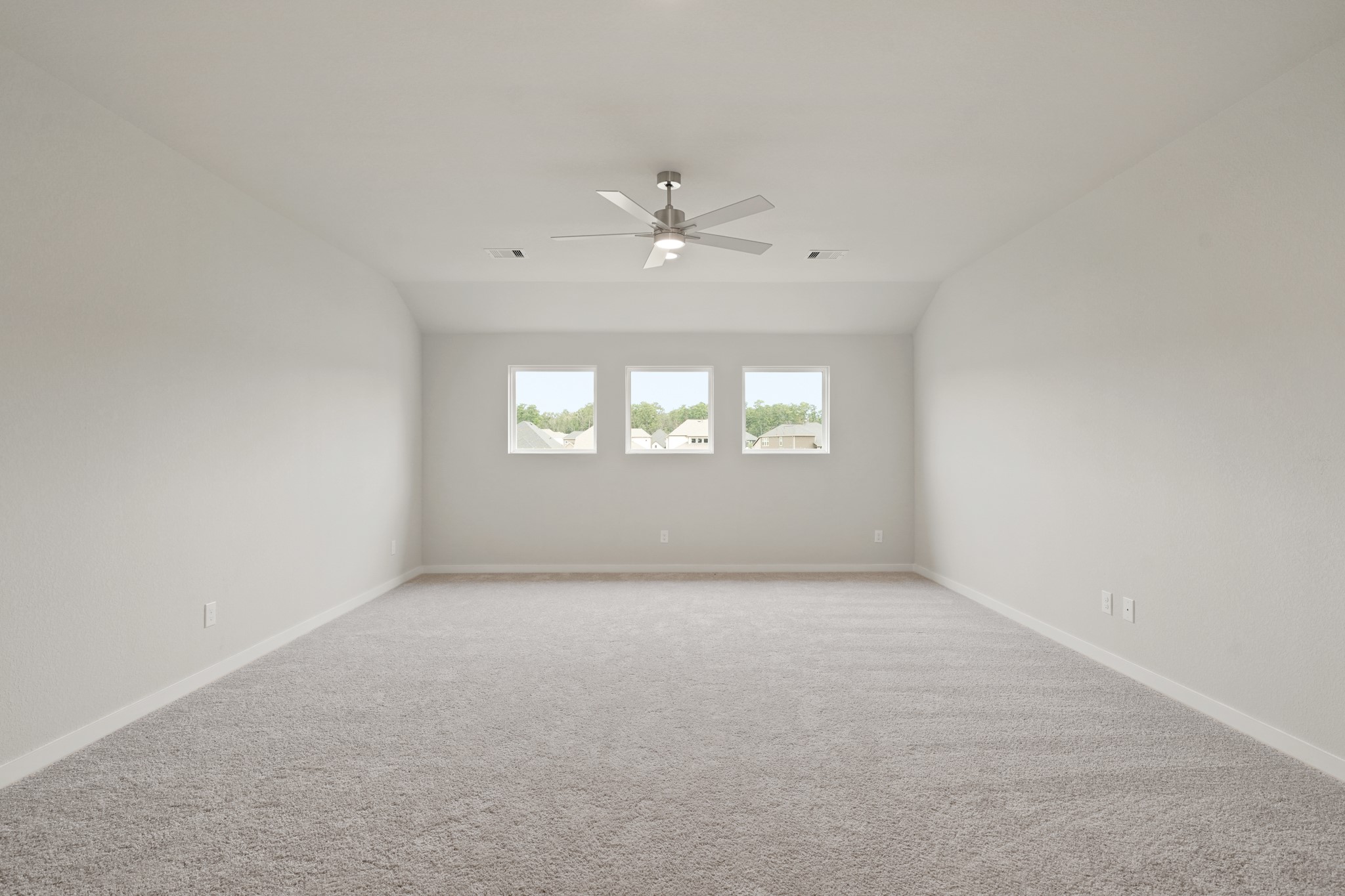 3319 Pin Cherry Lane Conroe, TX 77301 - Photo 18 of 30 an empty room with a window and a ceiling fan